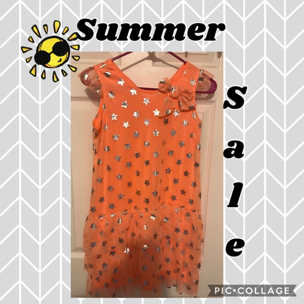 Adorable orange dress with metallic silver stars!